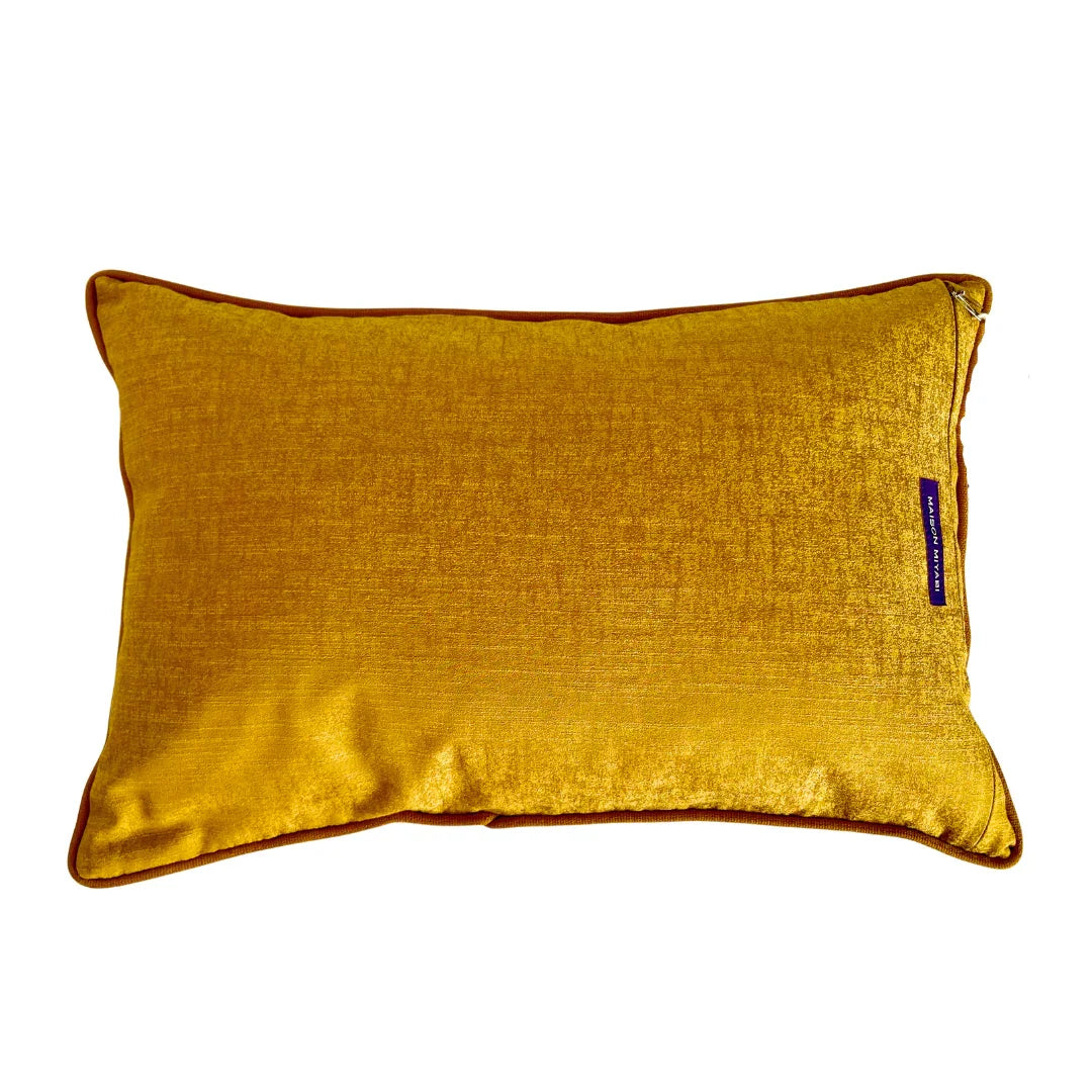 Rectangular golden yellow vintage kimono cushion with piping detail on white background
