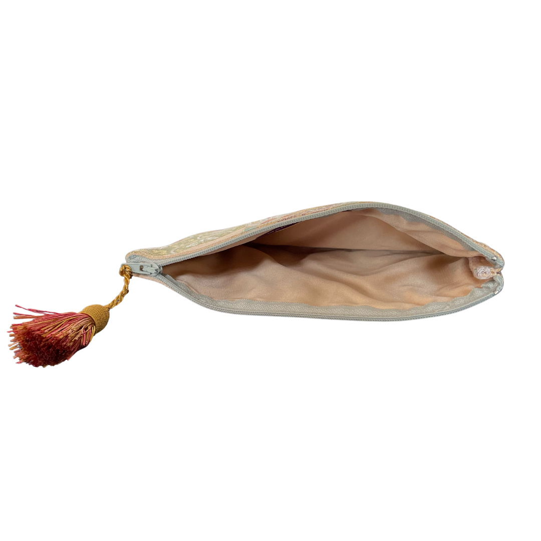 Open vintage obi kimono pouch with beige lining and decorative tassel zipper