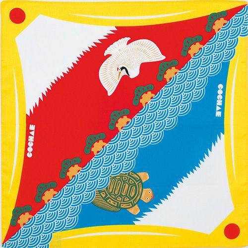 Colorful Japanese scarf with crane, turtle, pine trees, and wave patterns on red, yellow, and blue background.