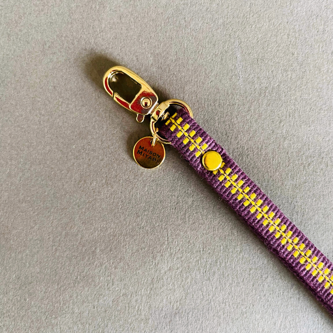 Purple and yellow woven strap with gold hardware by MAISON MIYABI Paris